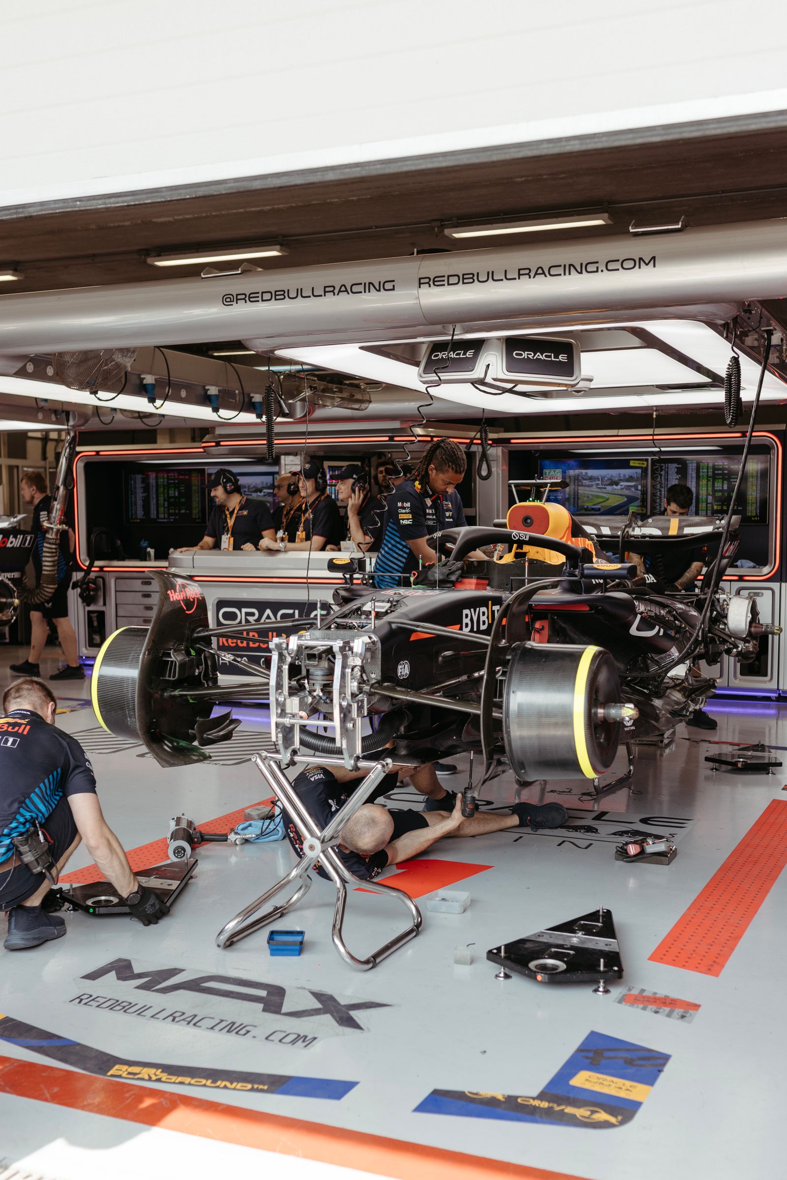A formula car being prepared in a team garage